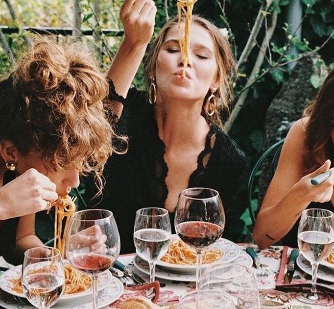 Friends gathered at an outdoor dinner